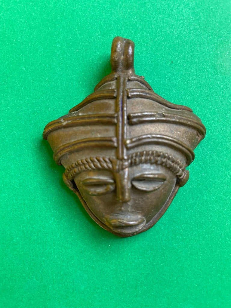 Small Nigerian bronze mask pendant