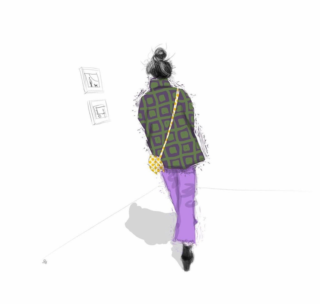 Woman wearing stylish purple trousers in an art gallery 